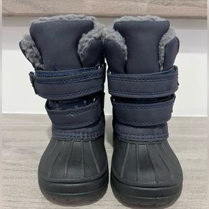 Brand new winter boots. Toddler size 6. Navy & black
